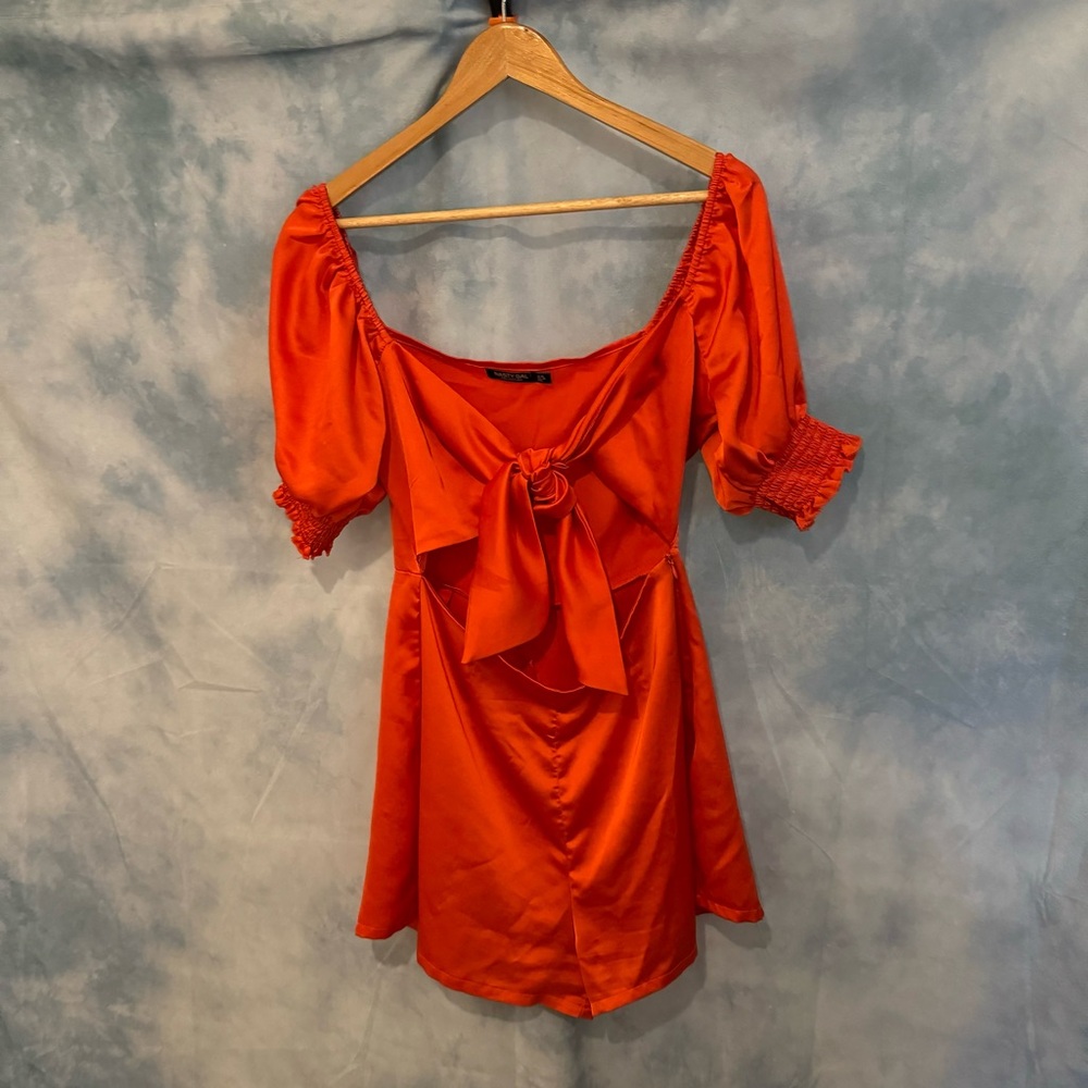 Nasty gal romper • tie front • puff sleeves • zips on side of hip • size 6 •